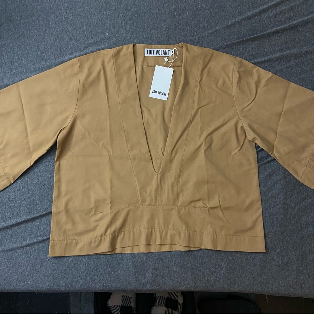 tan toit volant low v-neck top